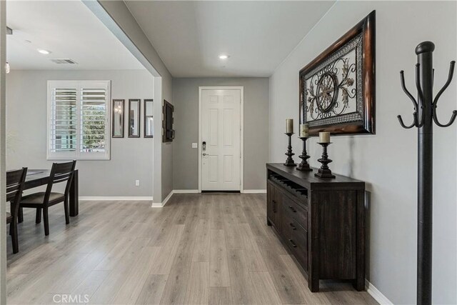 29042 Botanical Cir, Menifee, CA 92584 - entryway featuring light wood-style floors, baseboards, and recessed lighting