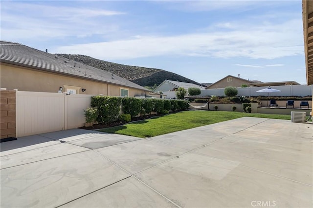 29042 Botanical Cir, Menifee, CA 92584 - view of patio featuring a mountain view and central air condition unit