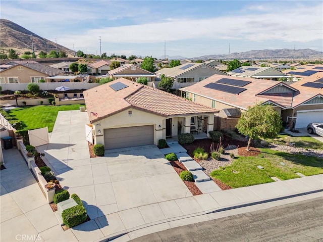 29042 Botanical Cir, Menifee, CA 92584 - view of front of house featuring a residential view, a garage, concrete driveway, stucco siding, and a tiled roof