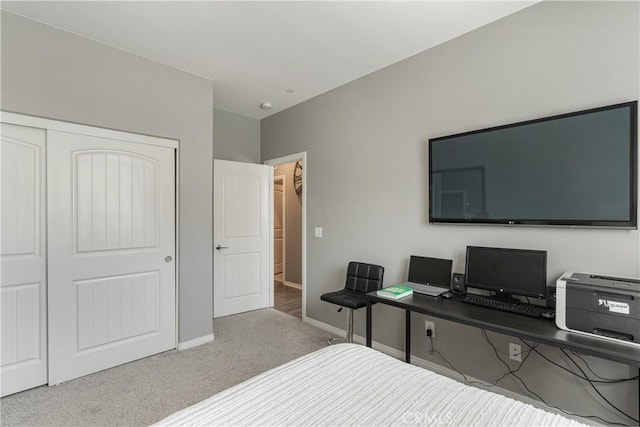 29042 Botanical Cir, Menifee, CA 92584 - carpeted bedroom with a closet, baseboards, and an office area