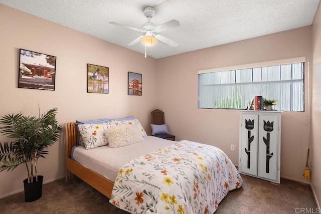 7780 Parkway Dr Unit 703, La Mesa, CA 91942 - bedroom featuring carpet flooring, baseboards, a ceiling fan, and a textured ceiling