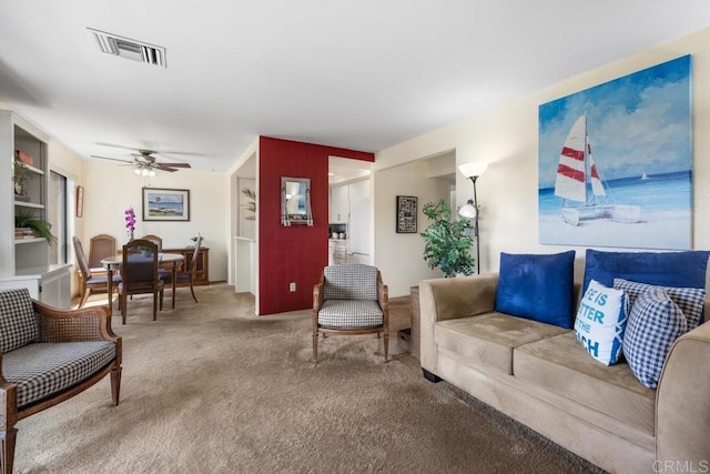 7780 Parkway Dr Unit 703, La Mesa, CA 91942 - living area featuring carpet and ceiling fan
