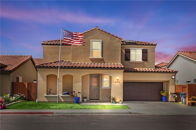 4375 Ladera Dr, Guadalupe, CA 93434 - mediterranean / spanish home with driveway, solar panels, a tiled roof, and stucco siding