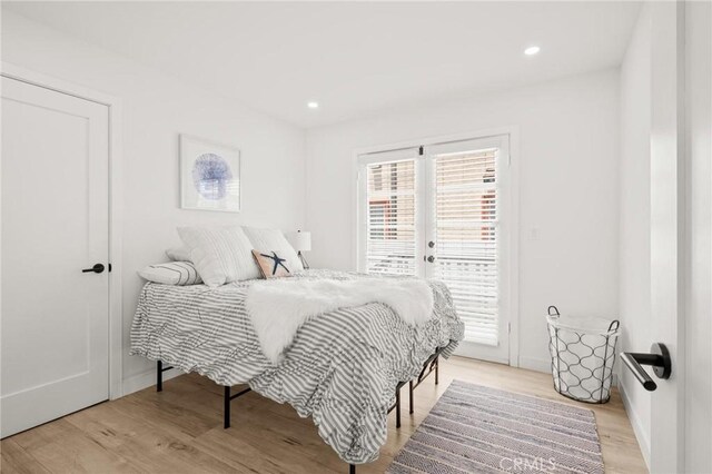 453 N Walker Ave, San Pedro, CA 90732 - bedroom featuring access to outside, light wood finished floors, recessed lighting, and french doors