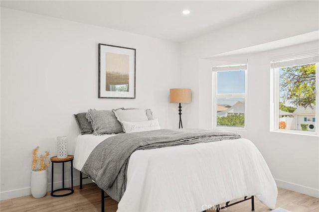 453 N Walker Ave, San Pedro, CA 90732 - bedroom featuring baseboards, wood finished floors, and recessed lighting