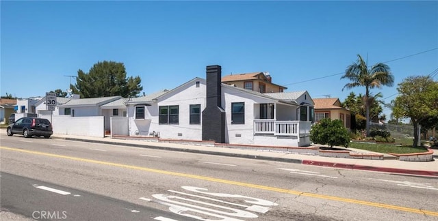 453 N Walker Ave, San Pedro, CA 90732 - ranch-style house with a chimney and covered porch