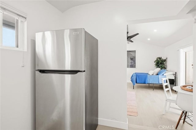 453 N Walker Ave, San Pedro, CA 90732 - kitchen featuring freestanding refrigerator, vaulted ceiling, a ceiling fan, baseboards, and wood finished floors