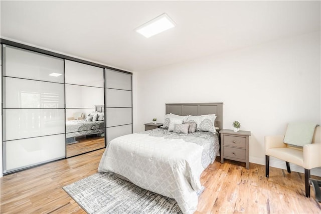 46 Echo Run Unit 16, Irvine, CA 92614 - bedroom with wood finished floors and baseboards