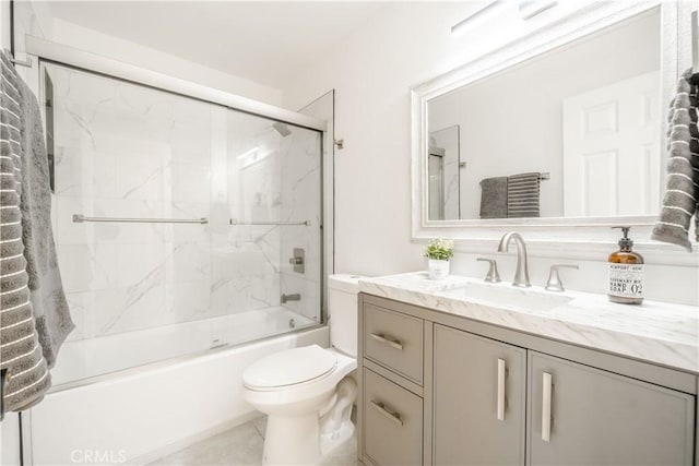 46 Echo Run Unit 16, Irvine, CA 92614 - full bath with toilet, vanity, and shower / bath combination with glass door