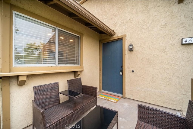 46 Echo Run Unit 16, Irvine, CA 92614 - view of exterior entry with stucco siding