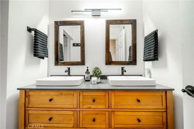 46 Echo Run Unit 16, Irvine, CA 92614 - bathroom featuring double vanity