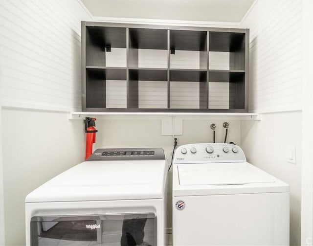46 Echo Run Unit 16, Irvine, CA 92614 - washroom with washing machine and clothes dryer