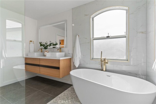 2011 Reynosa Dr, Torrance, CA 90501 - full bath with double vanity, a soaking tub, and tile patterned flooring