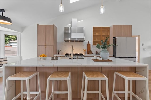 2011 Reynosa Dr, Torrance, CA 90501 - kitchen with freestanding refrigerator, modern cabinets, wall chimney range hood, lofted ceiling, and hanging light fixtures