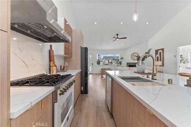 2011 Reynosa Dr, Torrance, CA 90501 - kitchen featuring wall chimney exhaust hood, range with gas cooktop, a sink, modern cabinets, and recessed lighting