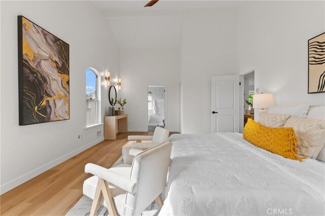 2011 Reynosa Dr, Torrance, CA 90501 - bedroom with light wood-type flooring, high vaulted ceiling, and baseboards