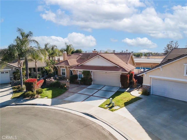 27141 Calle Ayrton, Menifee, CA 92586 - single story home with a tile roof, stucco siding, concrete driveway, stone siding, and a garage