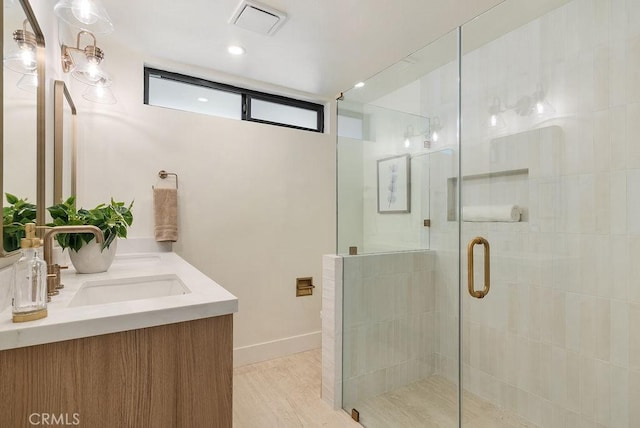 1932 Chapman Rd, Claremont, CA 91711 - full bath featuring double vanity, a shower stall, wood finished floors, and recessed lighting