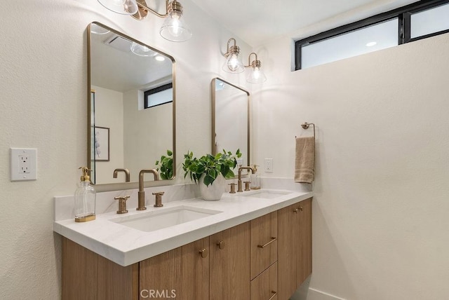 1932 Chapman Rd, Claremont, CA 91711 - full bathroom with double vanity and a textured wall