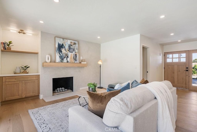 1932 Chapman Rd, Claremont, CA 91711 - living room featuring light wood-style floors, a fireplace, and recessed lighting