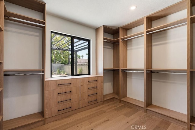 1932 Chapman Rd, Claremont, CA 91711 - walk in closet featuring light wood-type flooring