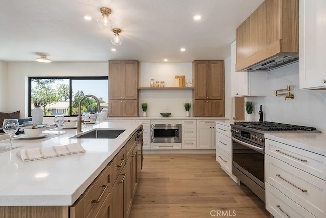 1932 Chapman Rd, Claremont, CA 91711 - kitchen featuring a sink, stainless steel appliances, open shelves, light wood finished floors, and recessed lighting