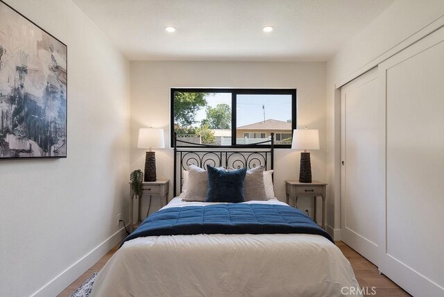 1932 Chapman Rd, Claremont, CA 91711 - bedroom featuring wood finished floors, recessed lighting, and baseboards