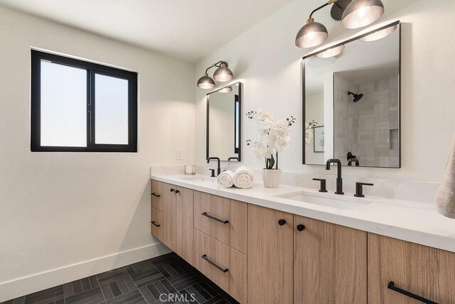 1932 Chapman Rd, Claremont, CA 91711 - full bath featuring double vanity, baseboards, and tiled shower