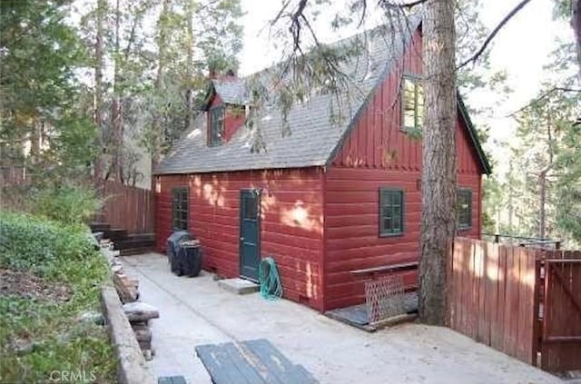 29053 Cedar Ter, Lake Arrowhead, CA 92321 - view of home's exterior featuring a patio and an outbuilding
