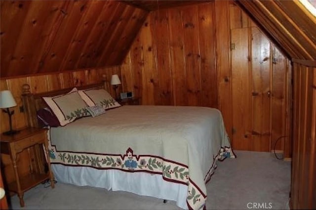 29053 Cedar Ter, Lake Arrowhead, CA 92321 - bedroom featuring lofted ceiling, wood walls, and carpet