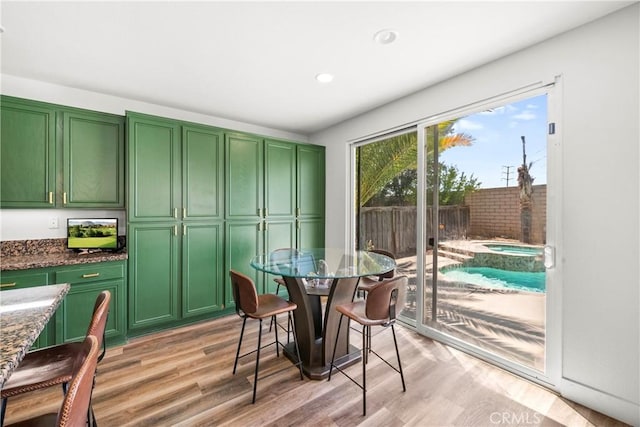 29889 Warm Sands Dr, Menifee, CA 92584 - dining area with light wood finished floors and recessed lighting