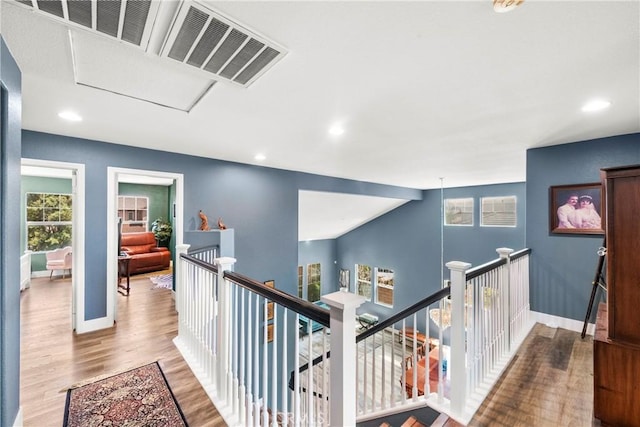 29889 Warm Sands Dr, Menifee, CA 92584 - corridor featuring an upstairs landing, wood finished floors, baseboards, recessed lighting, and attic access