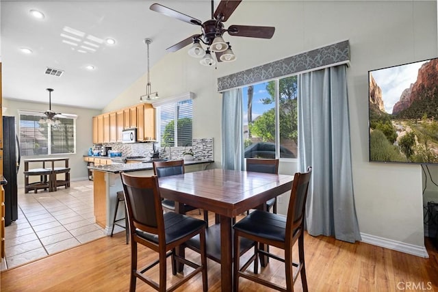 959 Corwin Pl, Hemet, CA 92544 - dining space with a ceiling fan, high vaulted ceiling, baseboards, recessed lighting, and light wood-type flooring