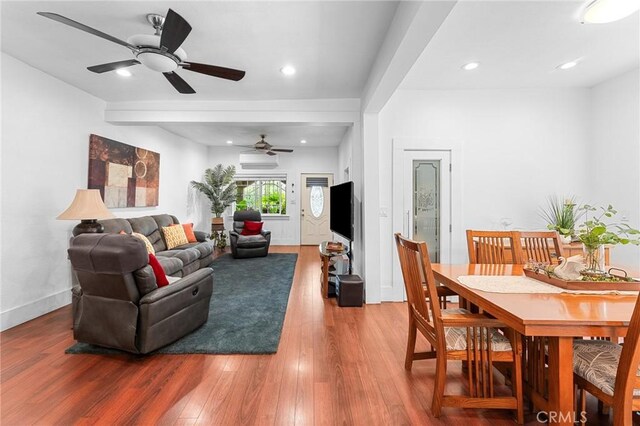1040 W 3rd St, Pomona, CA 91766 - living room with a ceiling fan, wood finished floors, baseboards, and recessed lighting