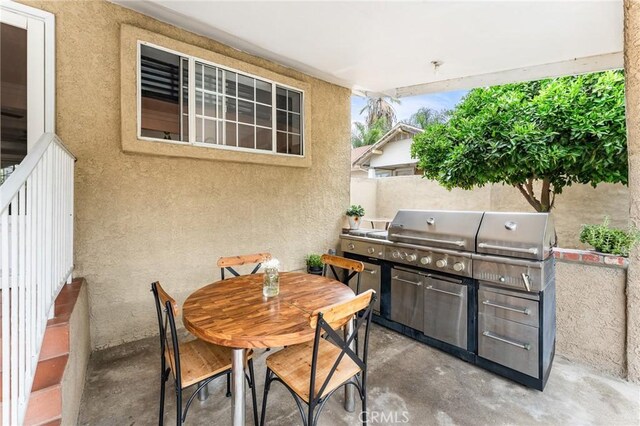 1040 W 3rd St, Pomona, CA 91766 - view of patio with outdoor dining area