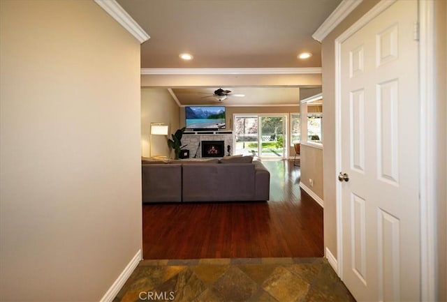 29911 Cactus Pl, Temecula, CA 92592 - corridor with ornamental molding, baseboards, stone finish flooring, and recessed lighting