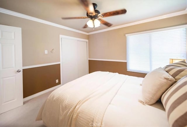 29911 Cactus Pl, Temecula, CA 92592 - bedroom featuring carpet flooring, a closet, a ceiling fan, baseboards, and crown molding