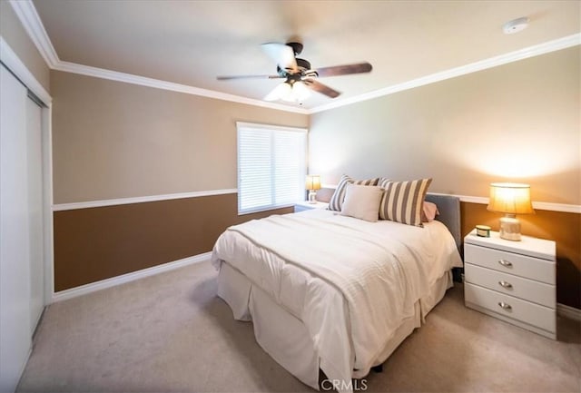 29911 Cactus Pl, Temecula, CA 92592 - bedroom with light colored carpet, a closet, crown molding, baseboards, and ceiling fan
