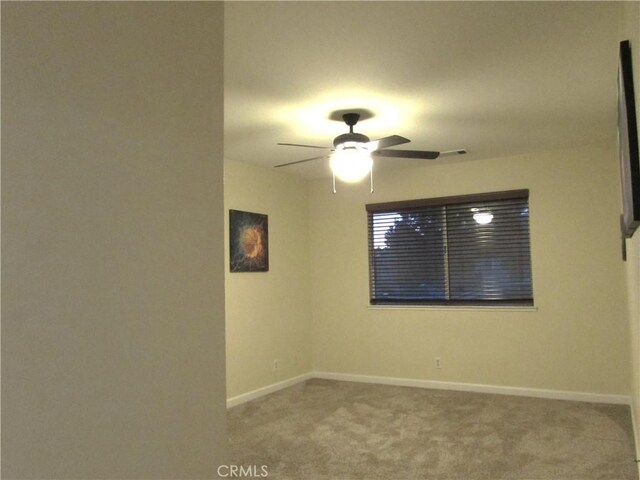 1575 Santa Inez Ct, Merced, CA 95340 - carpeted empty room with a ceiling fan and baseboards
