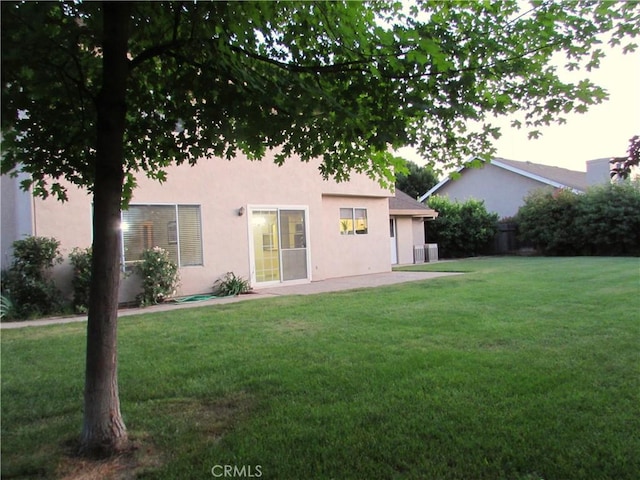 1575 Santa Inez Ct, Merced, CA 95340 - rear view of property with stucco siding