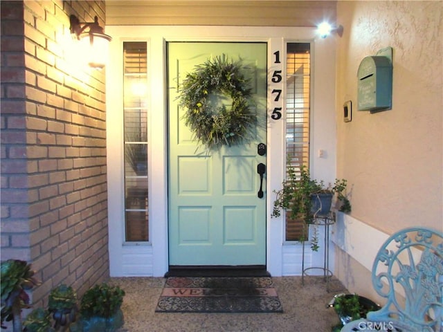 1575 Santa Inez Ct, Merced, CA 95340 - view of exterior entry featuring stucco siding