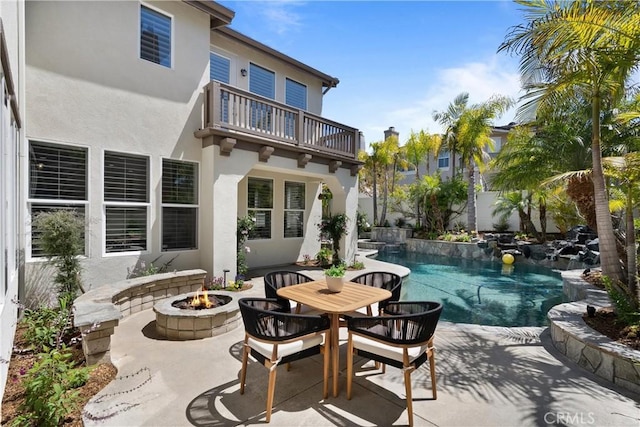 19139 Chandon Ln, Huntington Beach, CA 92648 - swimming pool featuring a fire pit and a patio