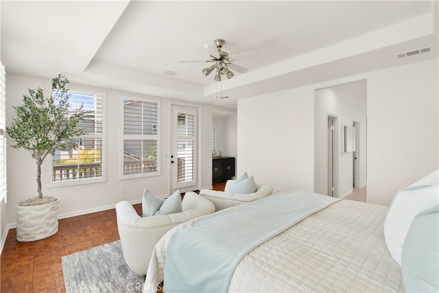 19139 Chandon Ln, Huntington Beach, CA 92648 - bedroom with a tray ceiling, baseboards, access to exterior, and ceiling fan