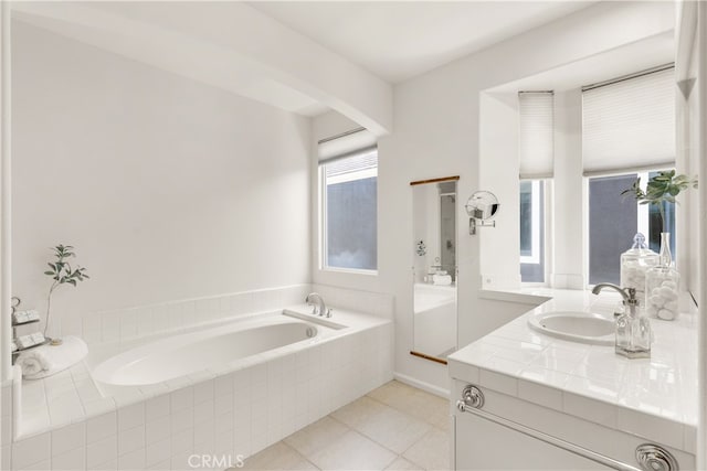 19139 Chandon Ln, Huntington Beach, CA 92648 - full bathroom featuring vanity, a bath, and tile patterned flooring