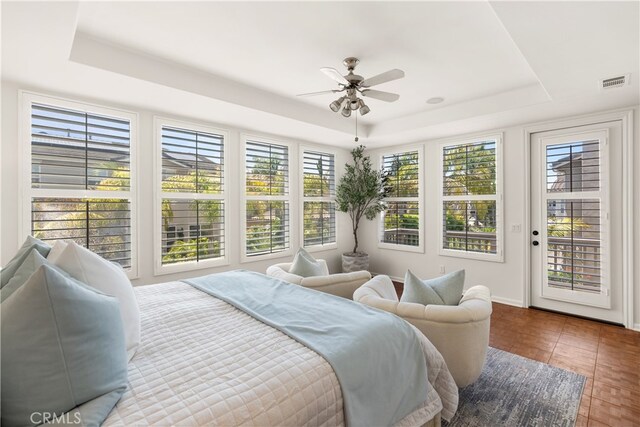 19139 Chandon Ln, Huntington Beach, CA 92648 - bedroom featuring a tray ceiling, access to outside, baseboards, and ceiling fan
