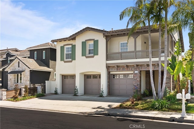 19139 Chandon Ln, Huntington Beach, CA 92648 - view of property featuring concrete driveway, stucco siding, an attached garage, a balcony, and a tiled roof