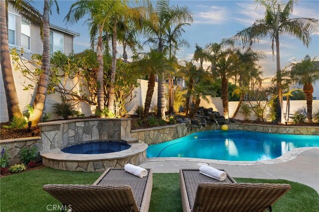 19139 Chandon Ln, Huntington Beach, CA 92648 - view of pool with a fenced backyard and a pool with connected hot tub