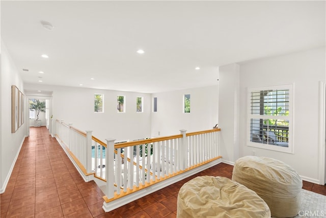 19139 Chandon Ln, Huntington Beach, CA 92648 - corridor featuring healthy amount of natural light, recessed lighting, an upstairs landing, and baseboards