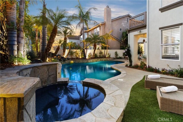 19139 Chandon Ln, Huntington Beach, CA 92648 - view of swimming pool with a pool with connected hot tub
