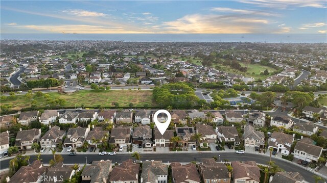 19139 Chandon Ln, Huntington Beach, CA 92648 - aerial view of property and surrounding area featuring nearby suburban area and a large body of water
